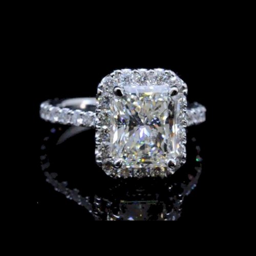 Radiant cut engagement rings halo
